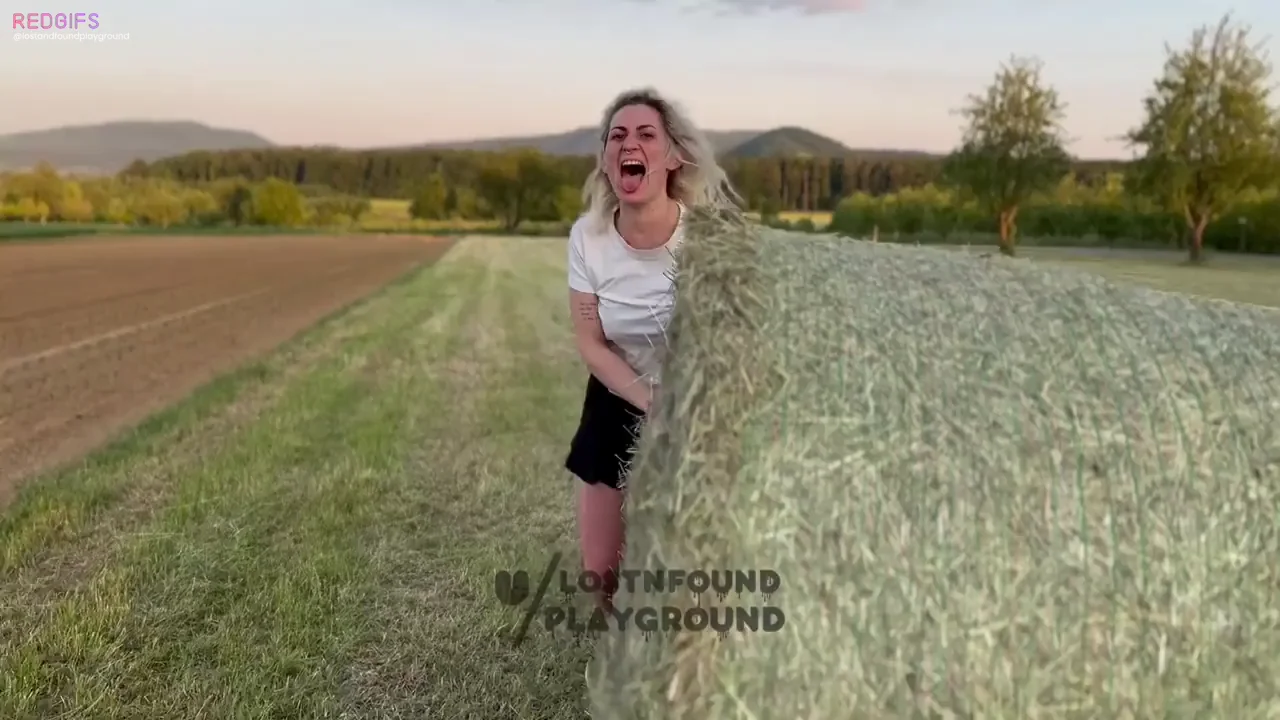 Playground Tease: Blonde Cutie Swings Her Slutty Curves in Public Hayfields