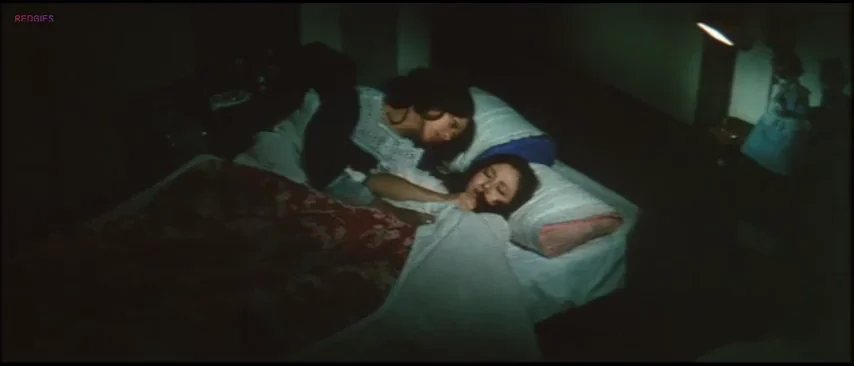 Reiko Ike and Miki Sugimoto in "The Insatiable"; Whoever thought to put the credits over this should have been sacked