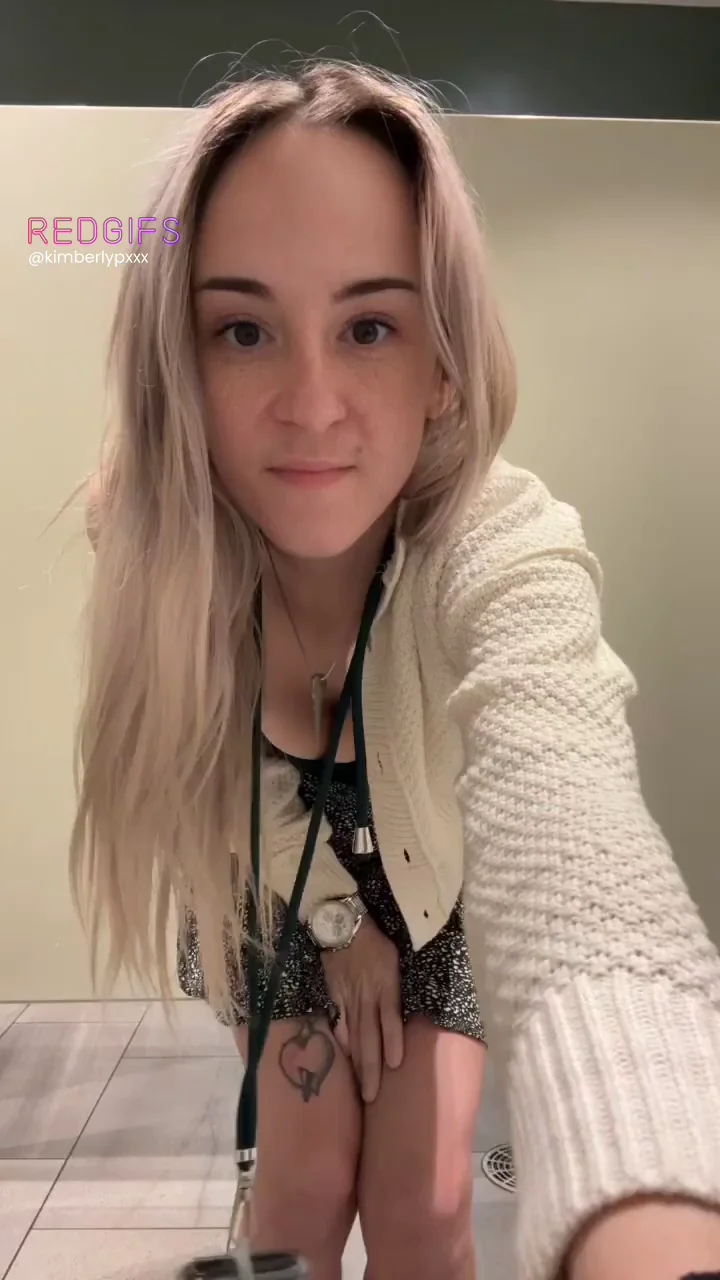 Sneaky Coworker Slut Lifts Skirt in Office Bathroom 😈