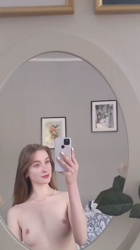 Sweet doll in the mirror