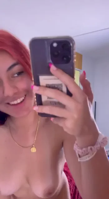 Curvy Redhead Teases Her Juicy Tits Begging for a Squeeze