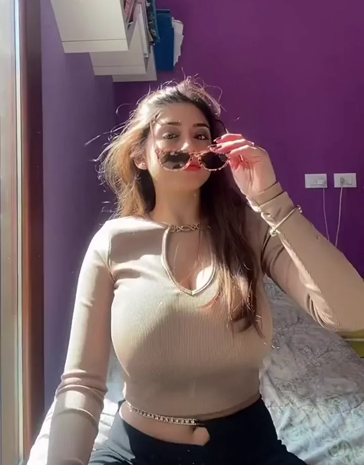Busty Babe's 'Little Cleavage' Tease in Tight Beige Top