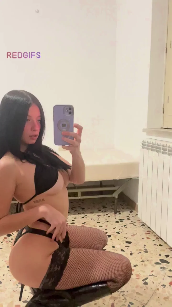 Your Sexiest TikTok Tease: Black-Haired Vixen in Lace Thong & Fishnets