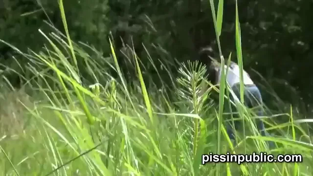 Nature loving girls release their piss streams on the meadow