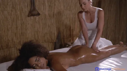 Nathaly Cherie gives Luna Corazon a massage and then shares her tongue and more with her.