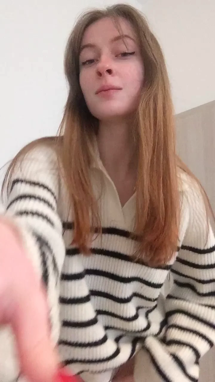 Playful Fuckdoll Teasing in Striped Sweater and Panties