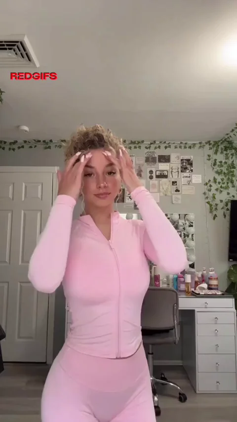 Pink Tracksuit Tease: Blonde Bombshell's Massive Tits Overflow