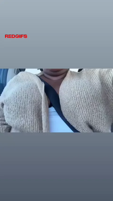 Eye-Poking Ebony Bombshell Flashes Massive Tits in Car