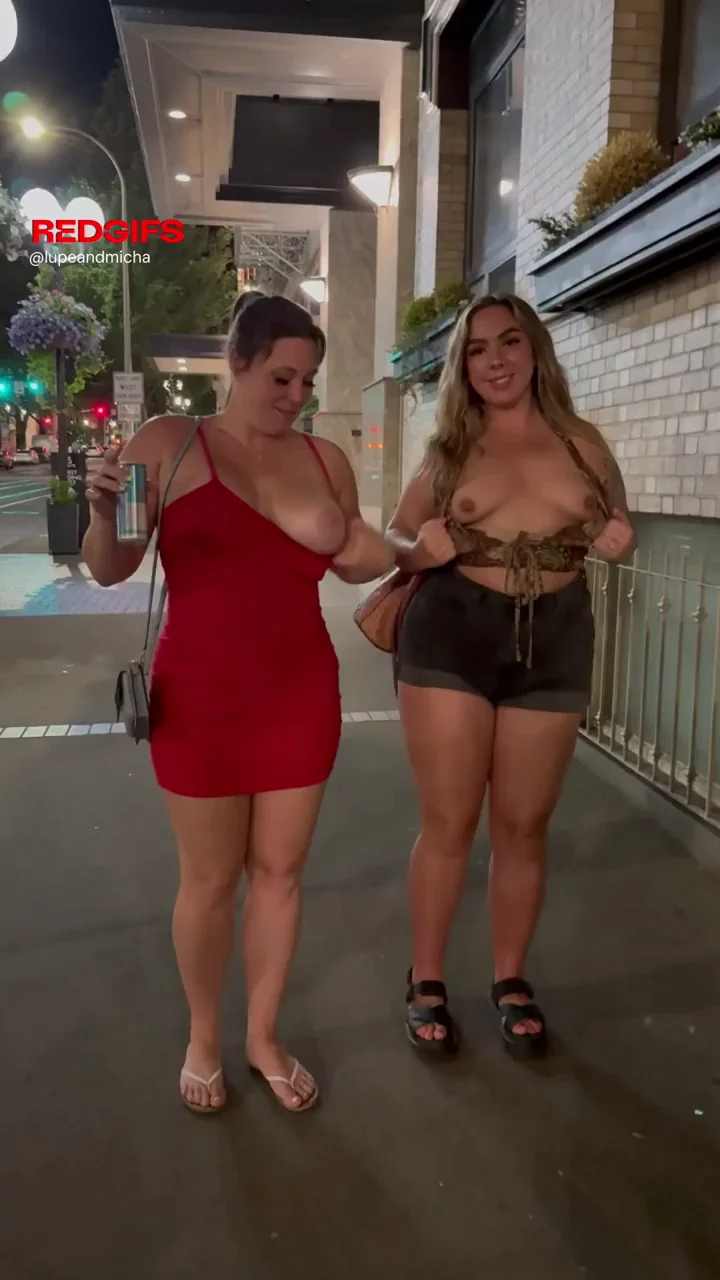 Flashing our beautiful tits in the streets for fun