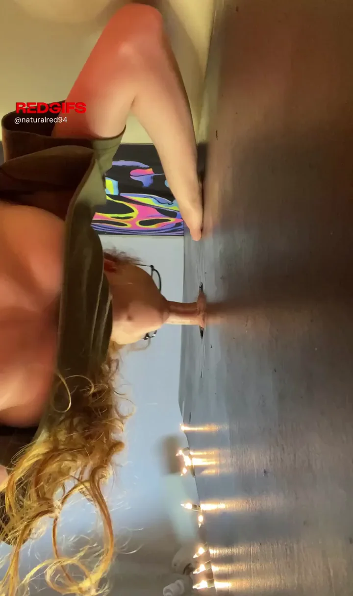 Redhead Vixen Ruins Glory Hole Cock and Splashes Her Cam