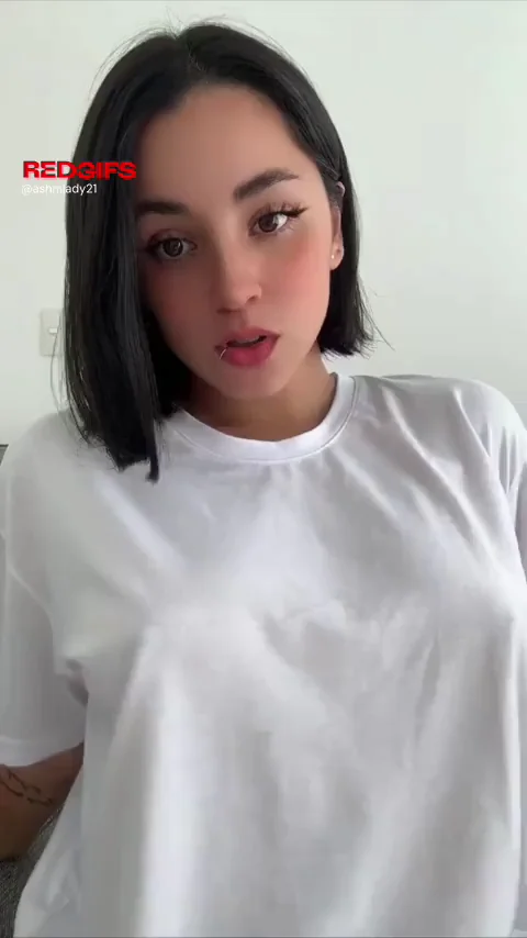 Petite teen shows her tits