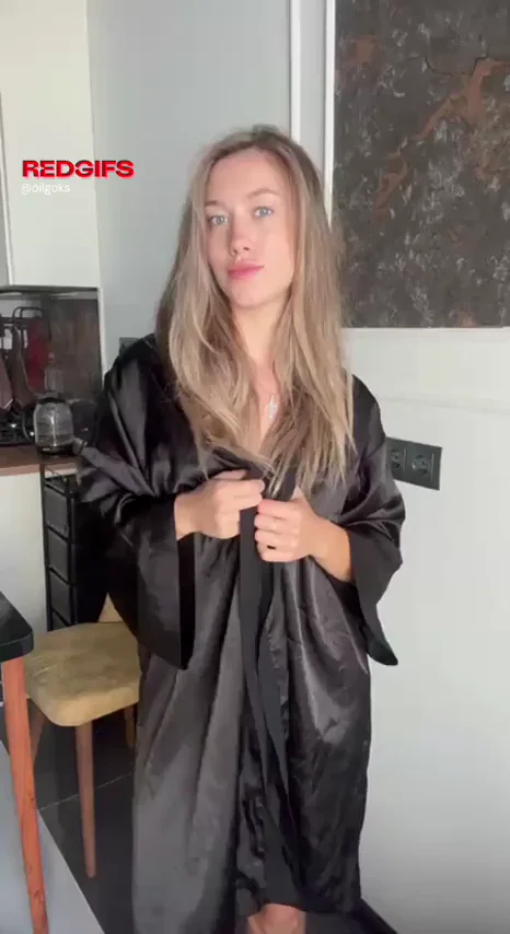 Silky Tease: Babe Ditches Robe for Full Nude Reveal