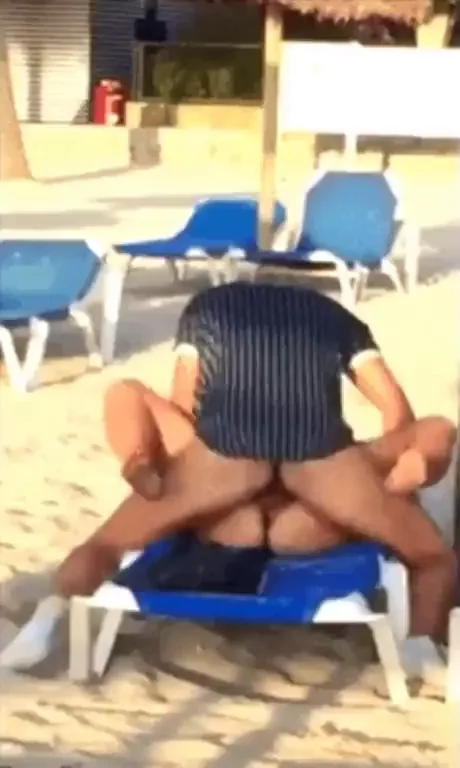 Drunk Amateurs on the beach as people pass by