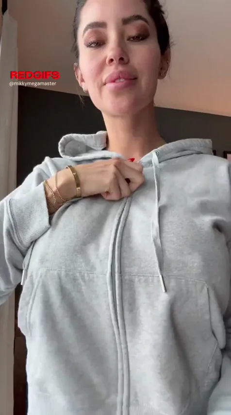 Caught Staring? Watch This Busty Latina Tease Unzip Her Hoodie