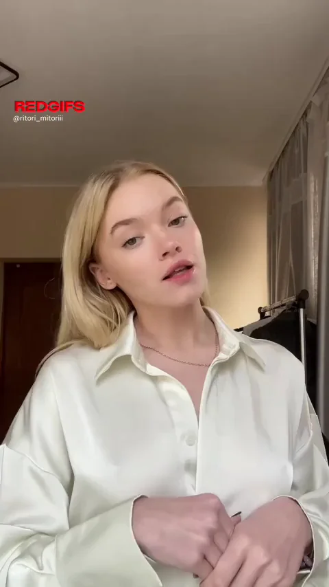 Blonde Bombshell's Silky Tease: Lips Puckered, Tits Tempting