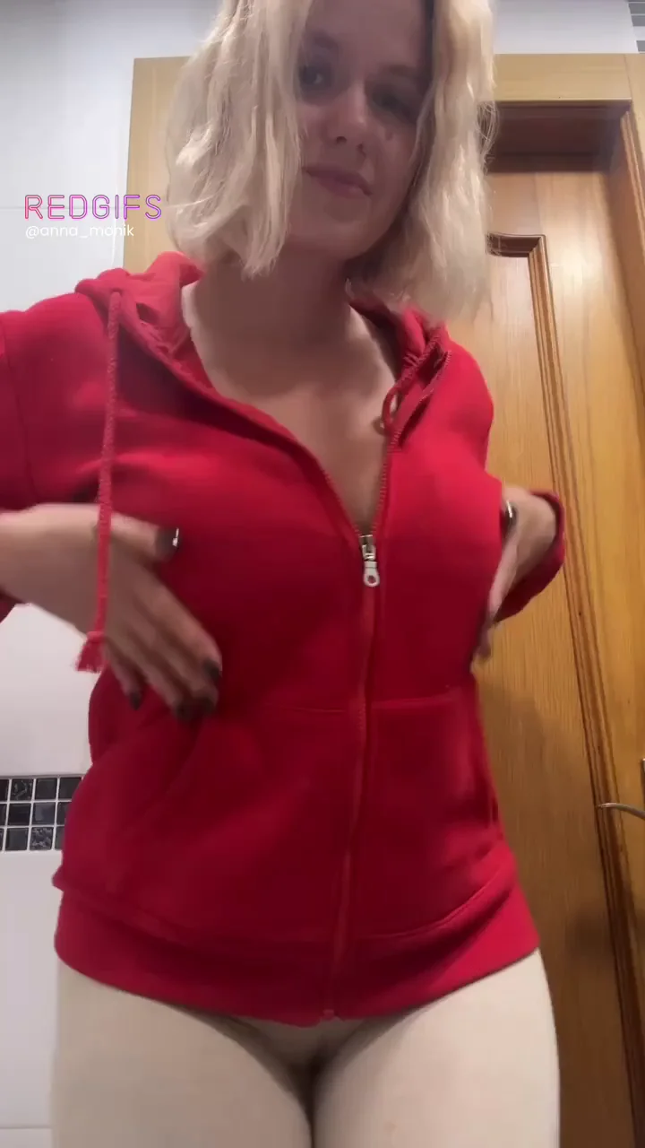 God Save the Zipper: Blonde Bombshell's Perky Tit Tease