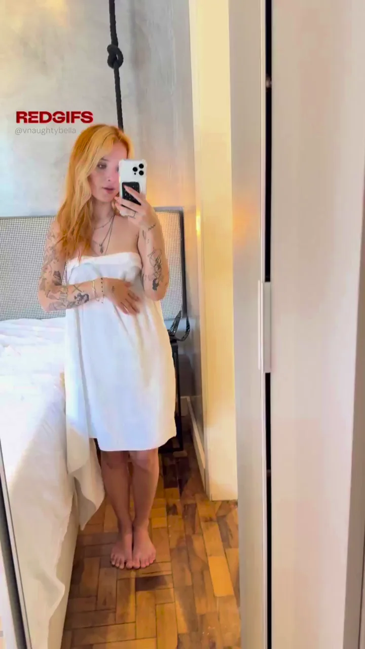 Fiery Redhead's Tiny Tit Tease Reveal