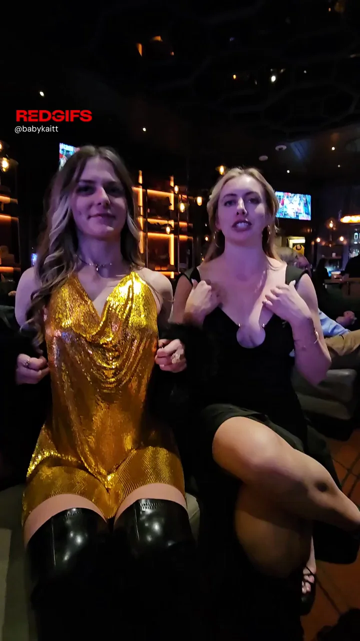 Two girls flashing in a full bar ;)