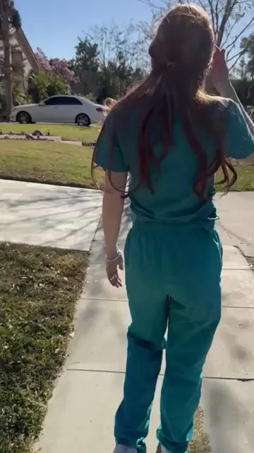 🔥 Naughty Redhead Nurse Flashes Juicy Ass on Public Sidewalk 😈🍑