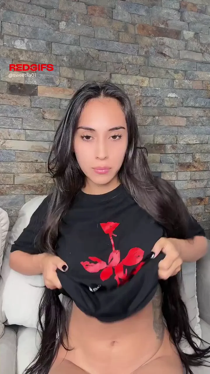 Latina Temptress Teases with Slutty Curves and Flower Flash