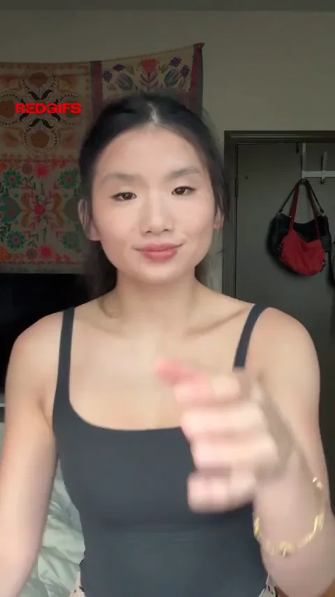 Asian Cutie’s Massive Tits Bounce Wild in Topless Slow-Mo Jump Fest