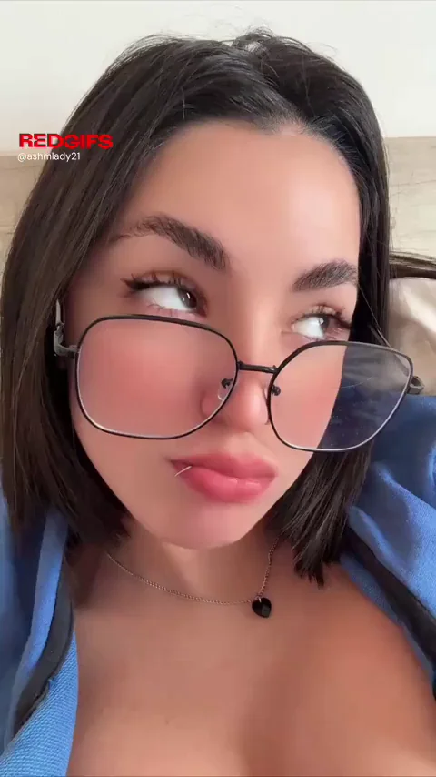 Latina with glasses shows her tits