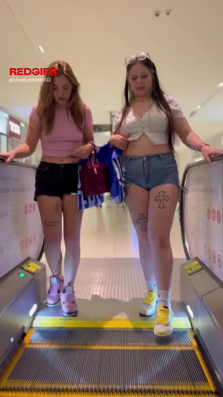 Showing off titties on the mall escalator