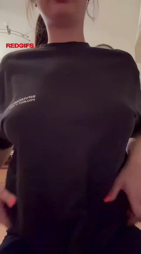 Grinning Slut Drops Massive Tits in Teasing Reveal
