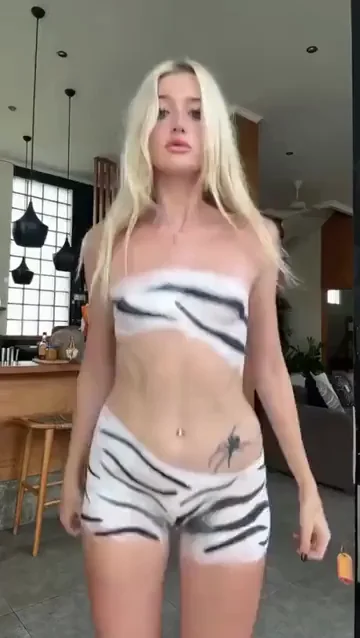 Painted Cross Slut: Blonde TikTok Tease in Zebra Body Paint