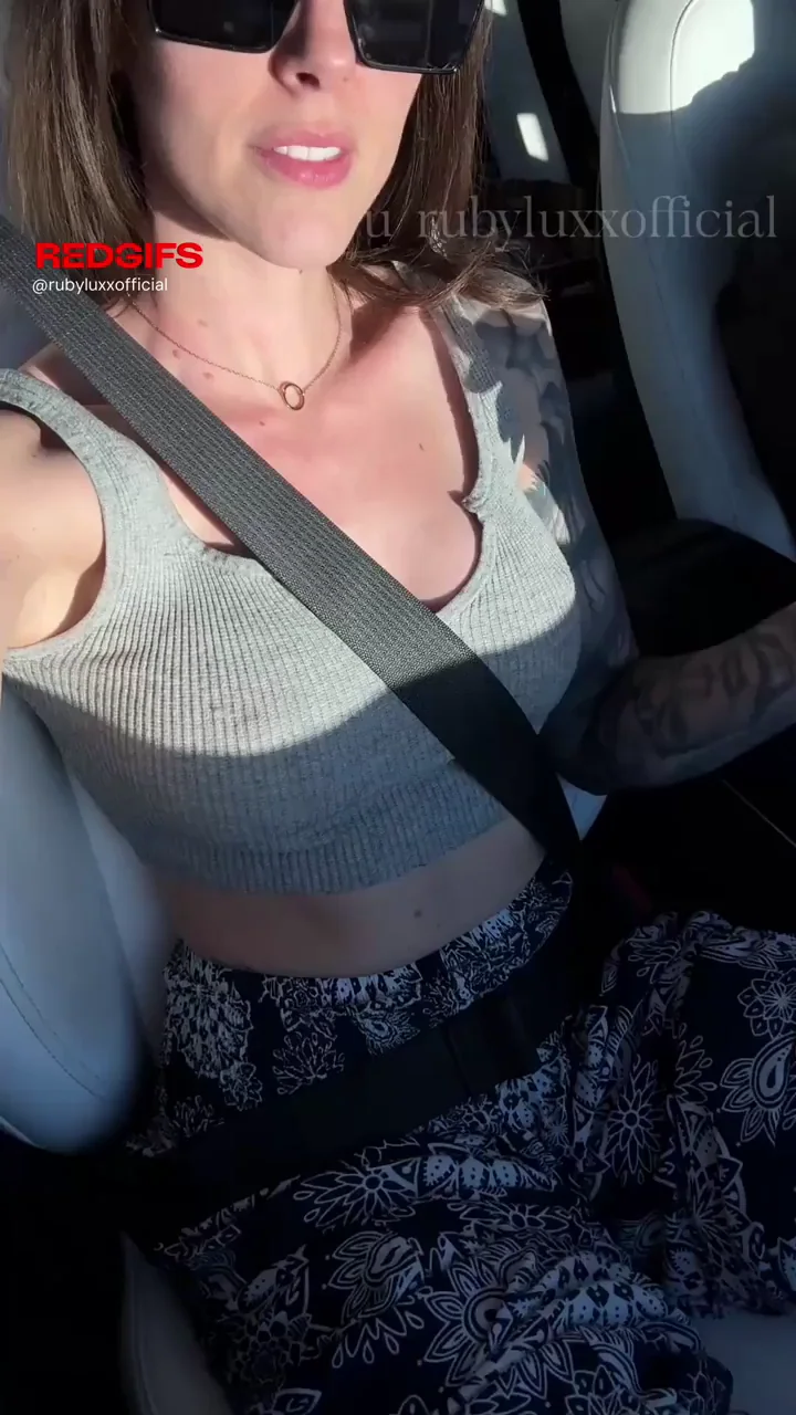 Showing off my fake tits in the car