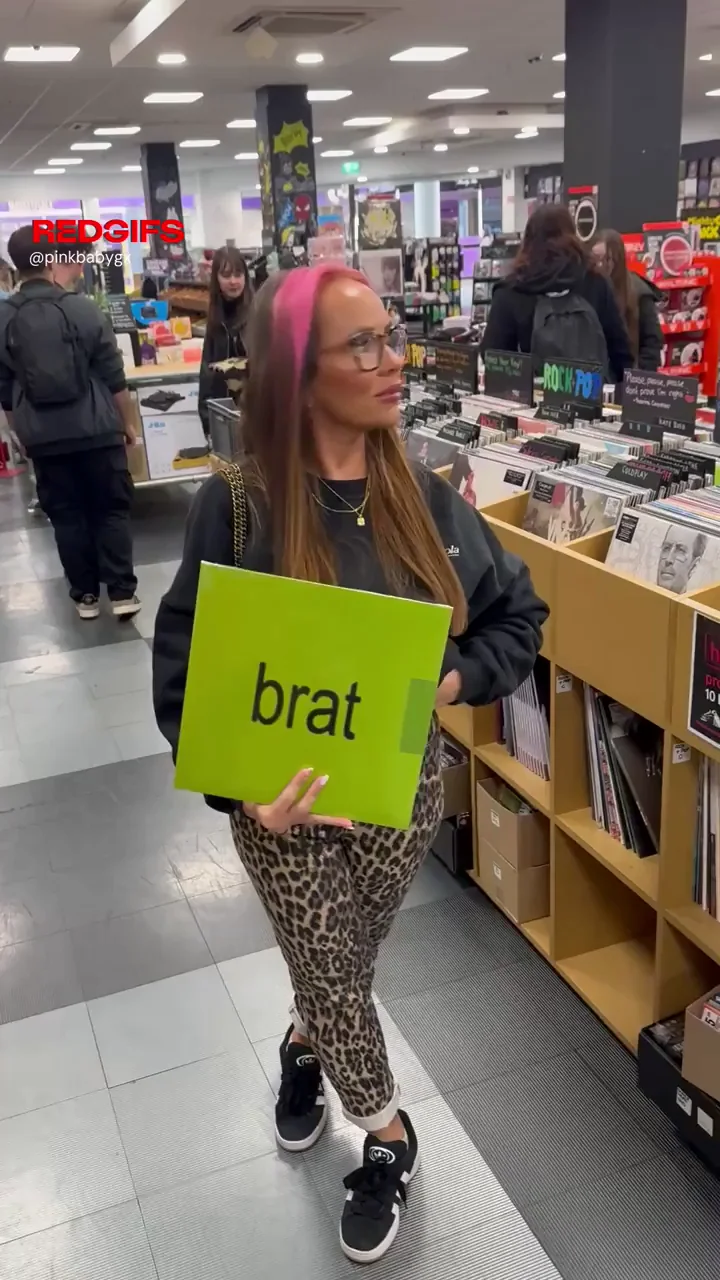 Brat Album Promo: Busty Babe Flashes Massive Tits in Record Store 😈🍈🍈