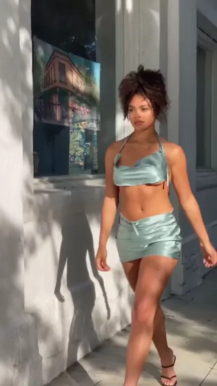 Caitlyn Mwenifumbo's Shiny Teeny Bikini Tease Stroll