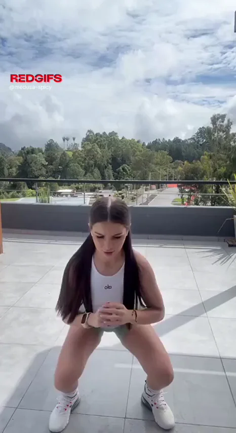 Petite Teen's Squat Tease in Tiny Shorts