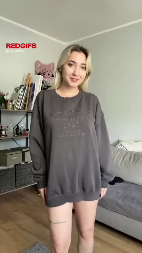 Busty blonde in clothes or naked?