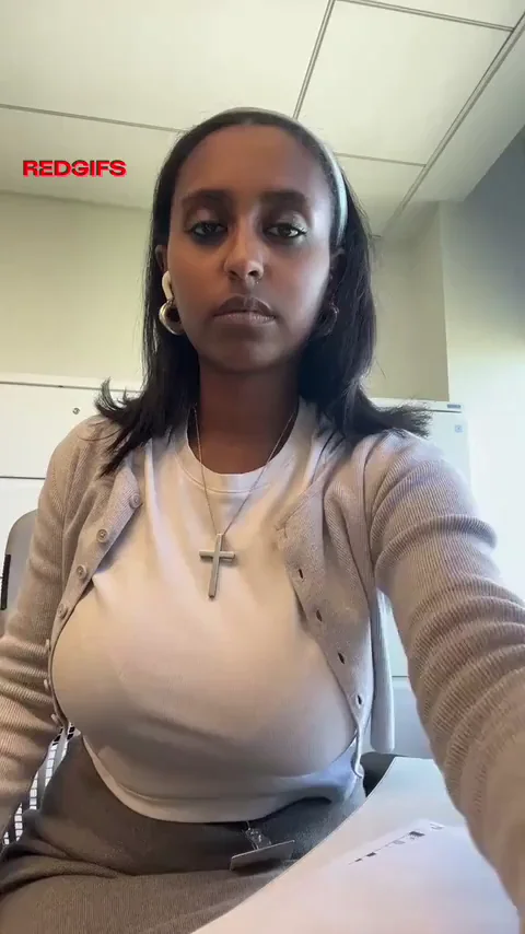 Stacked TikTok Tease: Busty Ebony Babe's Office Jiggle