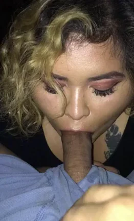 Pushing her head down.