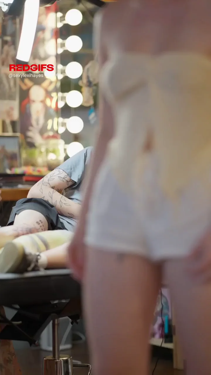 Flashing my tits at the tattoo shop!