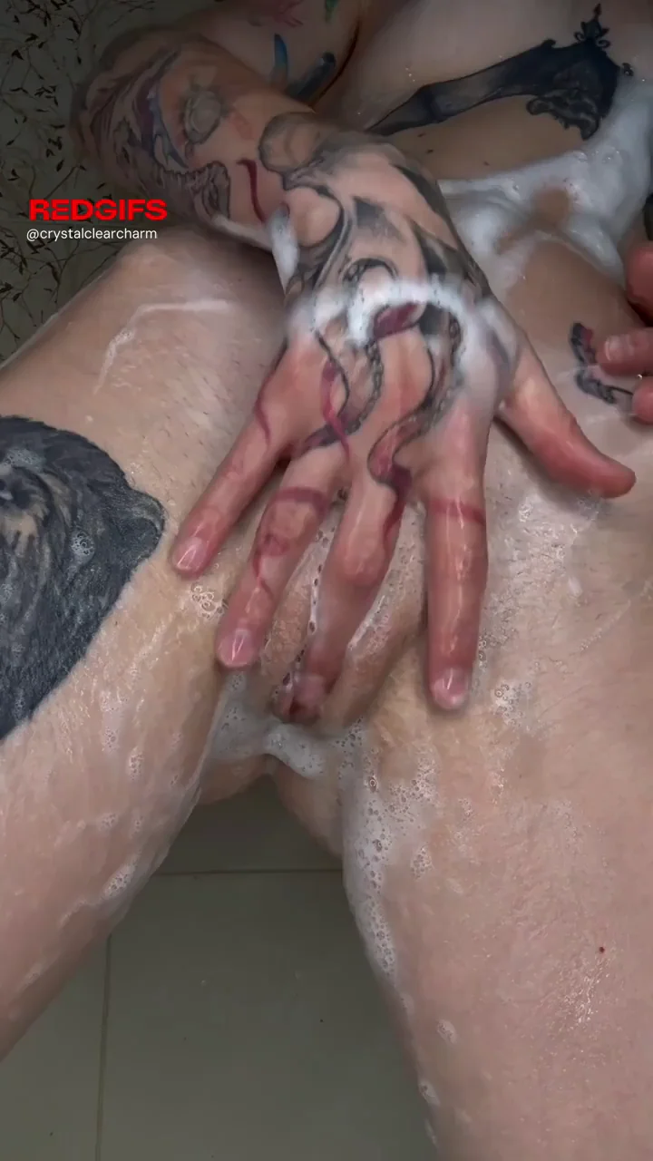 Inked Shower Slut Spreads Soapy Pussy for Your Help