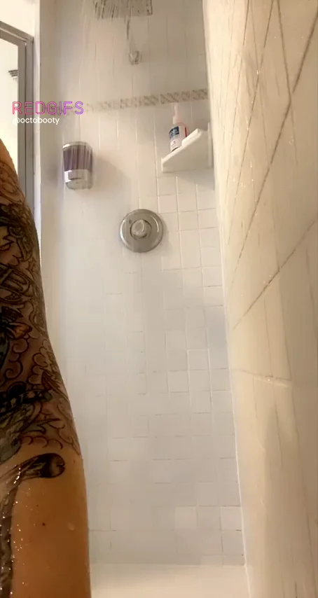 In the shower flashing my pussy at you