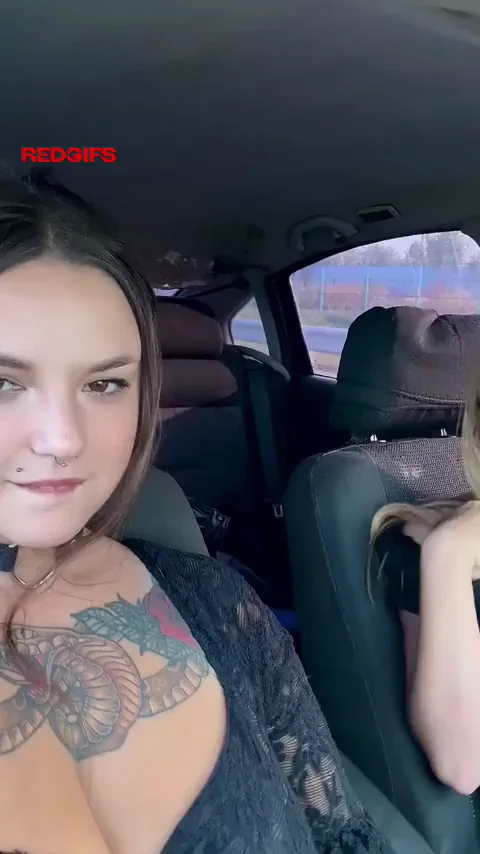 🚗 Driving Dyke Sucks Massive Tits While She Steers 😍🔥