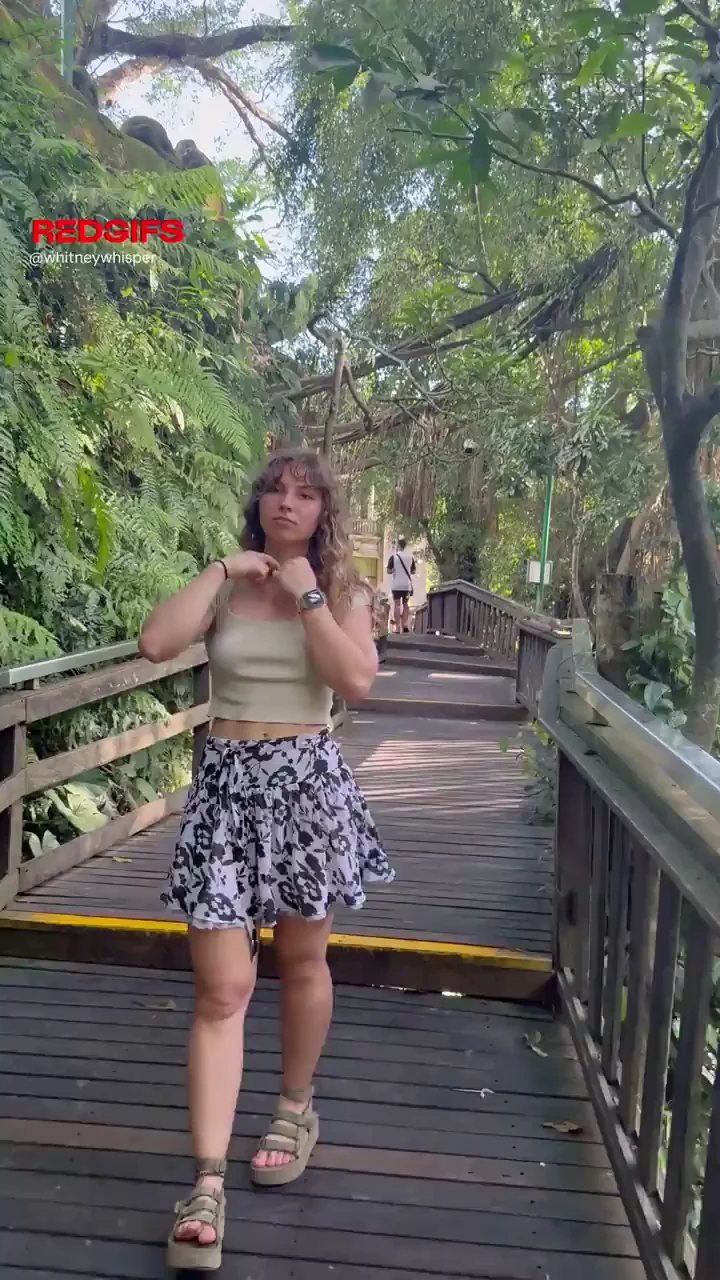 Exhibitionist Slut Flashes Perky Titties on Jungle Boardwalk