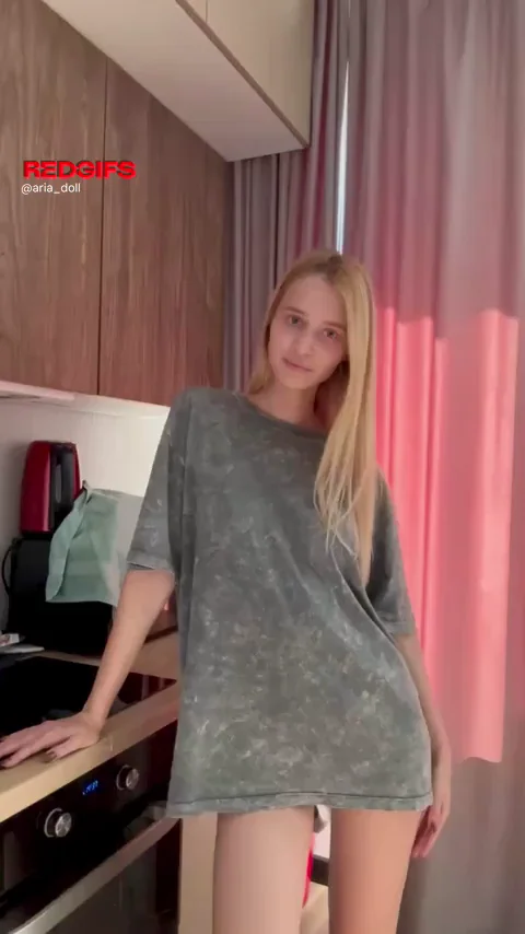 Petite Blonde Tease: Clothed to Nude Kitchen Flash