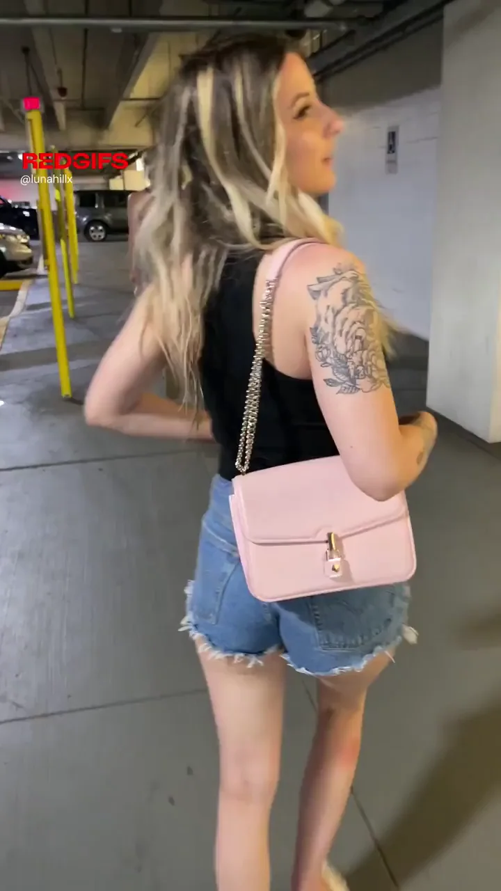 Titties out in the parking garage