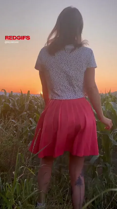 Pulling my skirt up in the fields