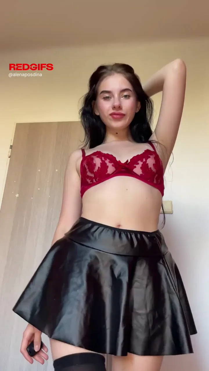Red panties under a skirt look sexy