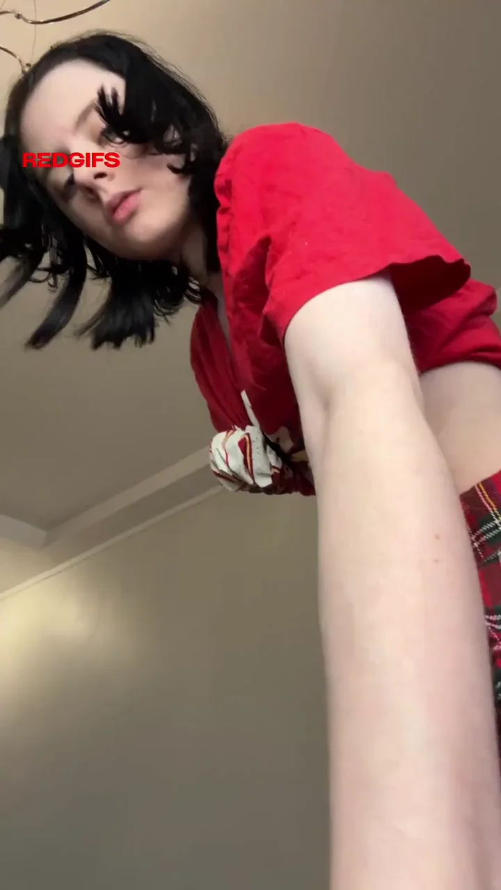 This young woman is prepared to show you the upskirt view.