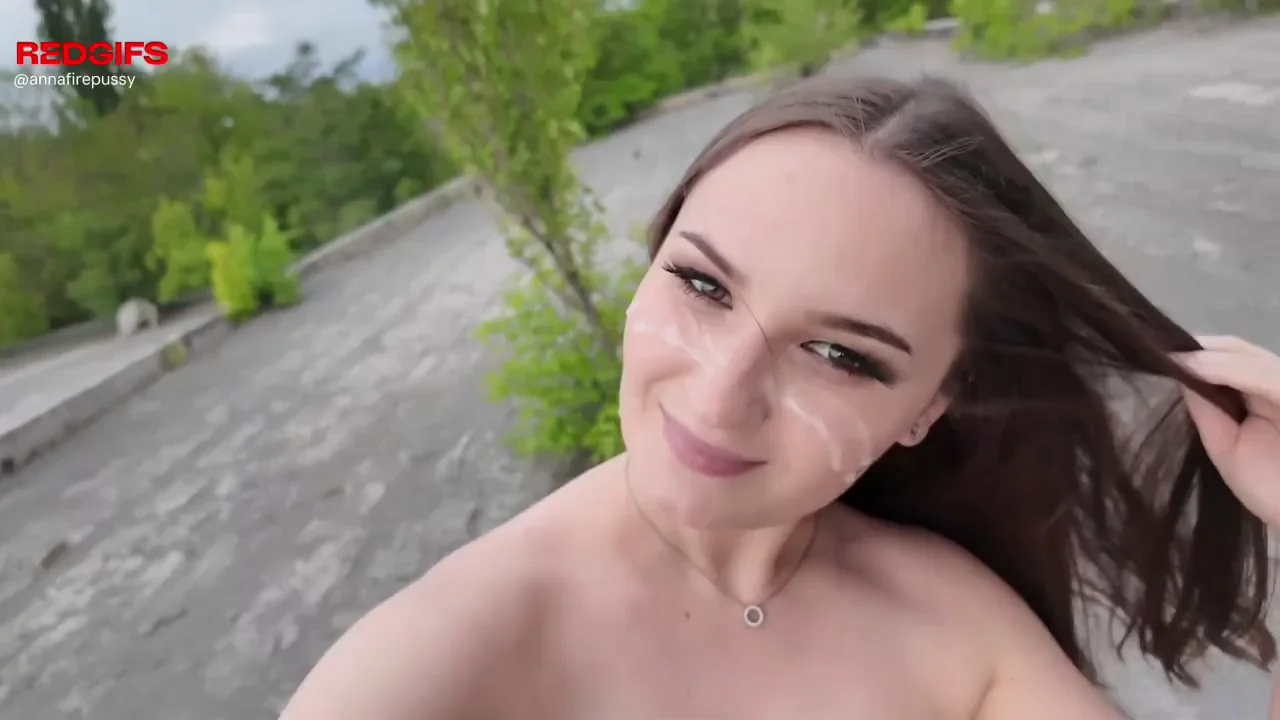 Look at her face she's covered of cum