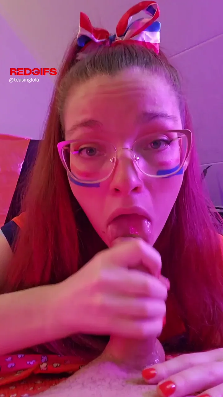 Using her mouth