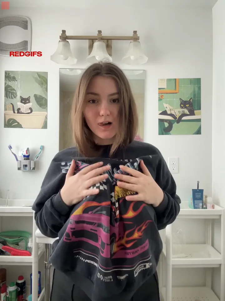 Goth GF Teases Out Her Massive Boobies in the Bathroom