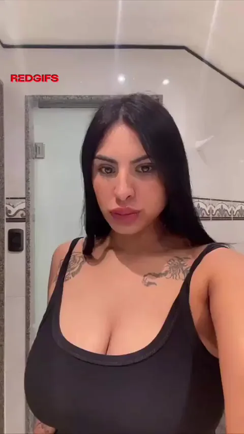 Asian beauty leaning in, ready to tease